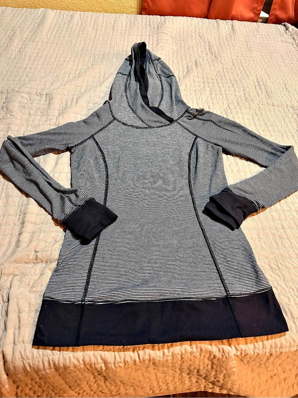 Lululemon Think Fast Hoodie featuring a gray-and-black striped or herringbone pa